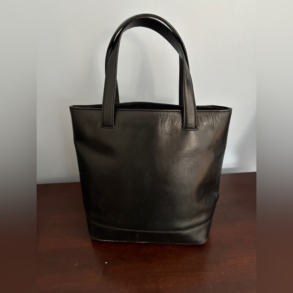 Cole Haan black vintage leather bag.